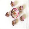 Traditionally decorated earthen diyas with wick view 1