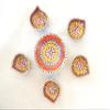 Traditionally decorated earthen diyas with wick view 1