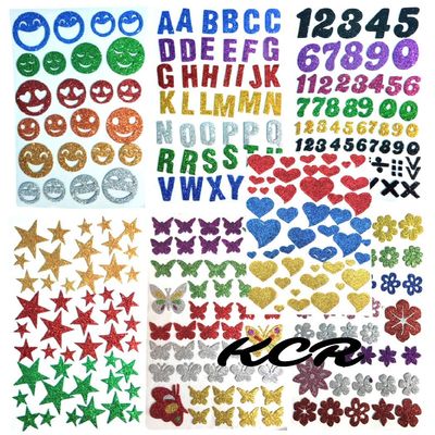 KCR Eva Foam Glitter Self Adhesive Alphabets, Butterflies, Stars, Numerics, Hearts, Flowers & Smileys Stickers for Kids Learning or Art & Craft (Set of 7)