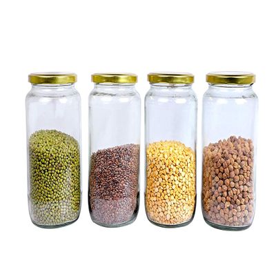 RAVIZAA Litre Round Glass Jar and Container (1000 ml) with Rust Proof Air Tight Lid for Kitchen Storage (Pack of 4, Clear, Gold)