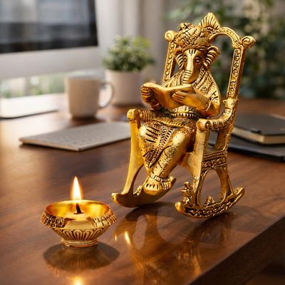 CHHARIYA CRAFTS Metal Lord Ganesh Reading Ramayana Statue Ganpati Sitting on Chair with Kuber Diya Idol for Home Office and Gifts Decor Corporate Gifts Decorative Showpiece - 14 cm (Metal, Gold)